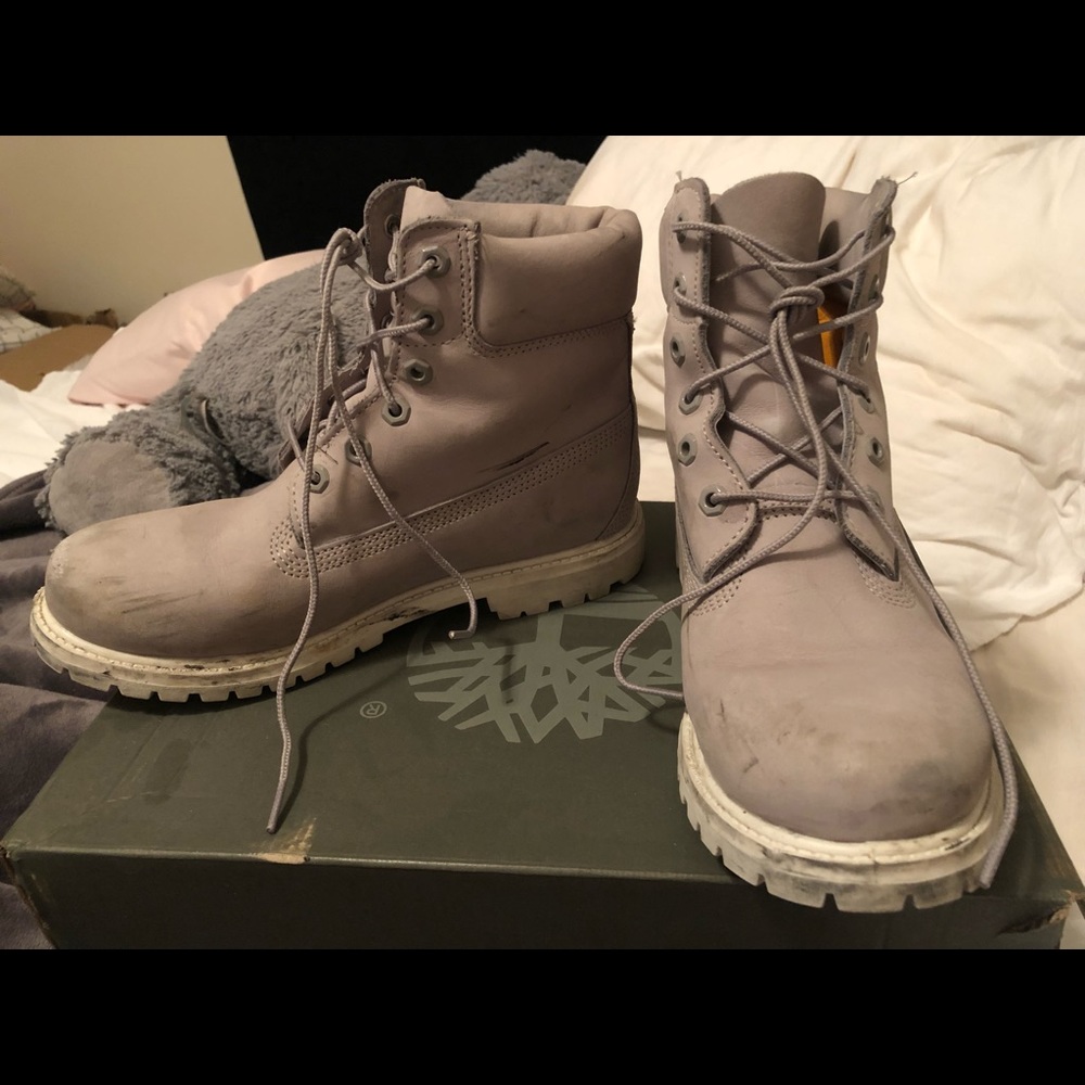 Grey and white Timberlands